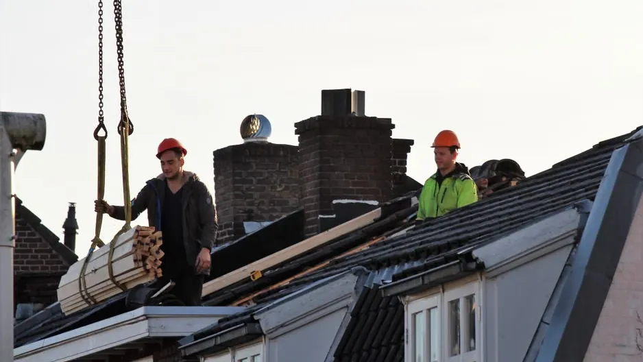 Men working on the roof.